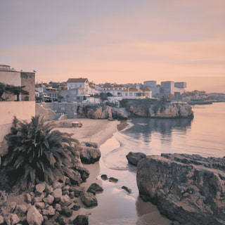 First Pink Light Over the Atlantic Ocean in Cascais, Portugal